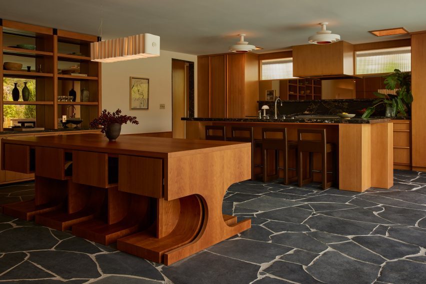 Kitchen and dining area with Willett's hourglass-shaped Roti Table and Dining Chairs
