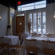 White tables and wooden chairs
