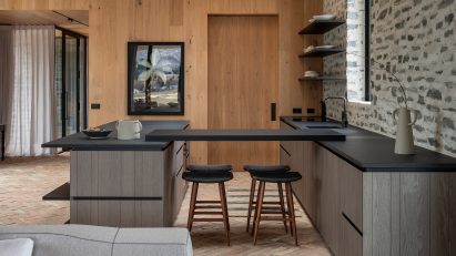 Kitchen interior with custom timber cabinetry and Fisher & Paykel appliances