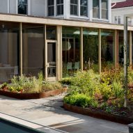 Glass enclosed kitchen underneath historic DC home