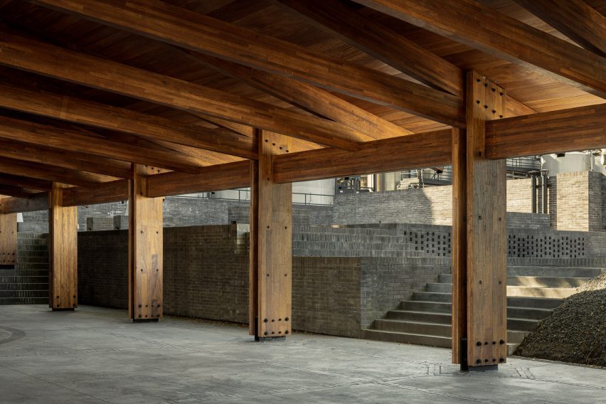 Roof truss and column structure is exposed inside a long building