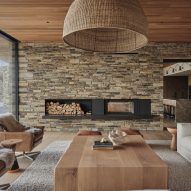 Fireplace in Two-Family House by Rundell Associates