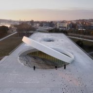SMAR Architecture Studio crowns science museum in Lithuania with sun-like disc
