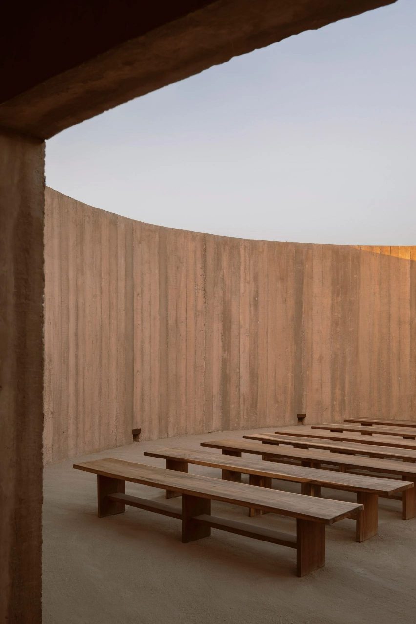 Wooden benches inside spiritual enclosure Mexico