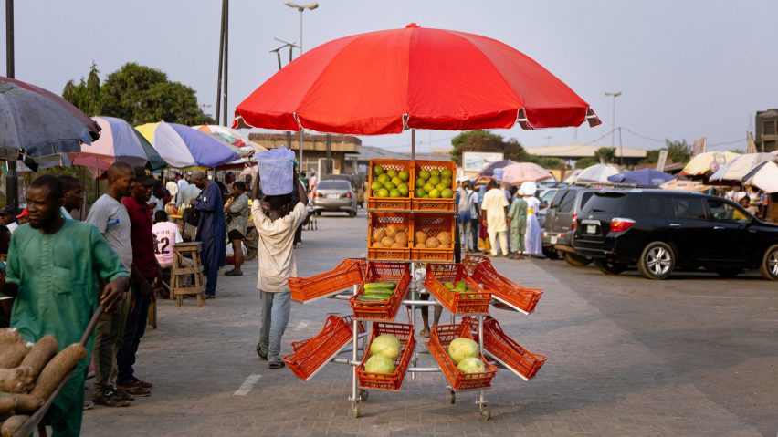 Umbrella Crate Stall by Paul Yakubu