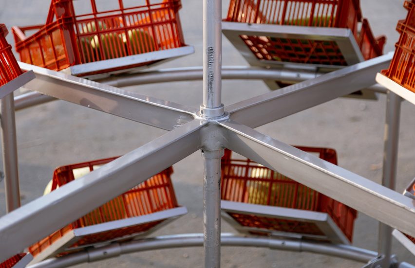 Central umbrella and framework of Umbrella Crate Stall by Paul Yakubu