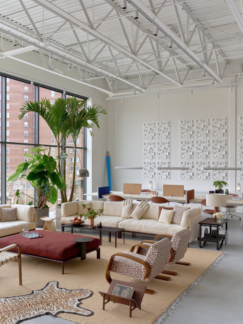 Furniture with reddish hues and animal prints within an open-plan showroom