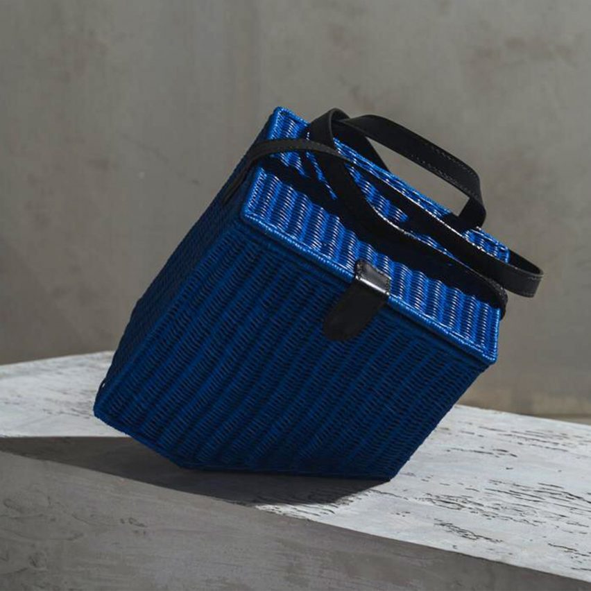 Photo of blue basket with black handle