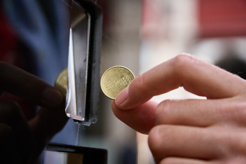 Golden token for a vending machine by Solus Ceramics