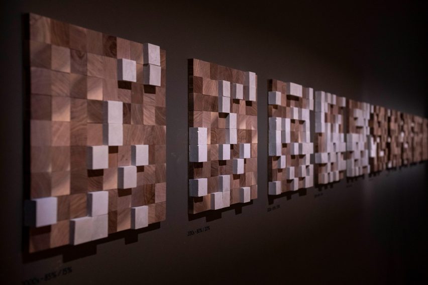 Wooden wall art displayed along gallery wall