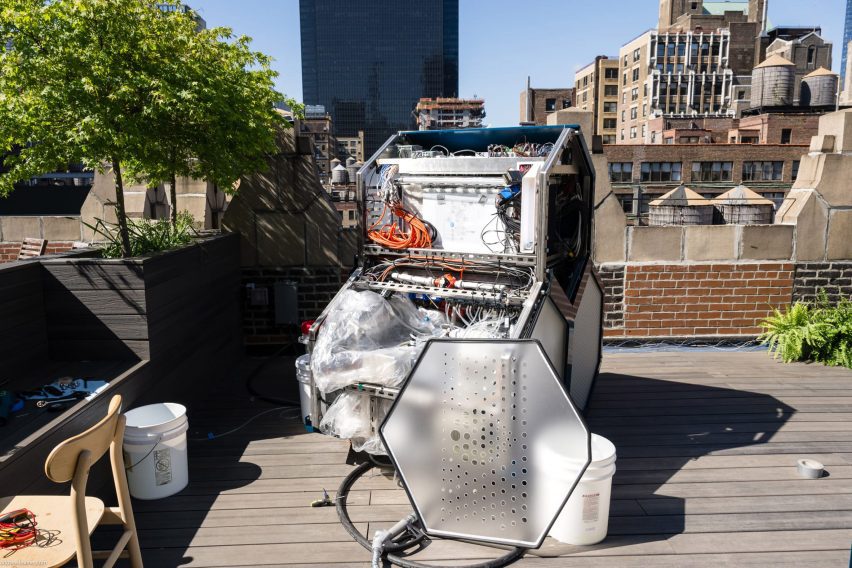 Photo of the Aircela machine open at the side to reveal a dense system of mechanics