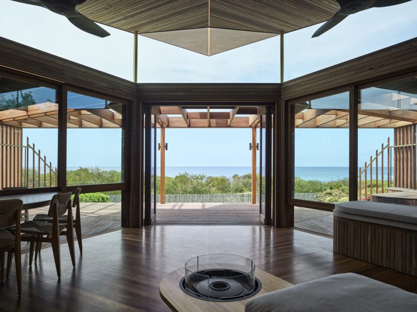 View towards the sea from within an updated home by Alexander Symes Architect