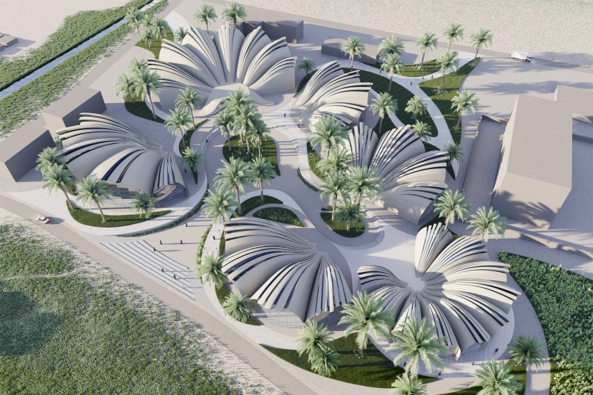 a visualisation of a group of circular white buildings from above, surrounded by greenery and palm trees