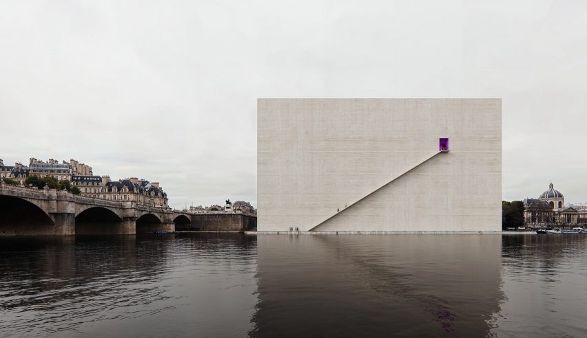 a visualisation of a beige square building by a river
