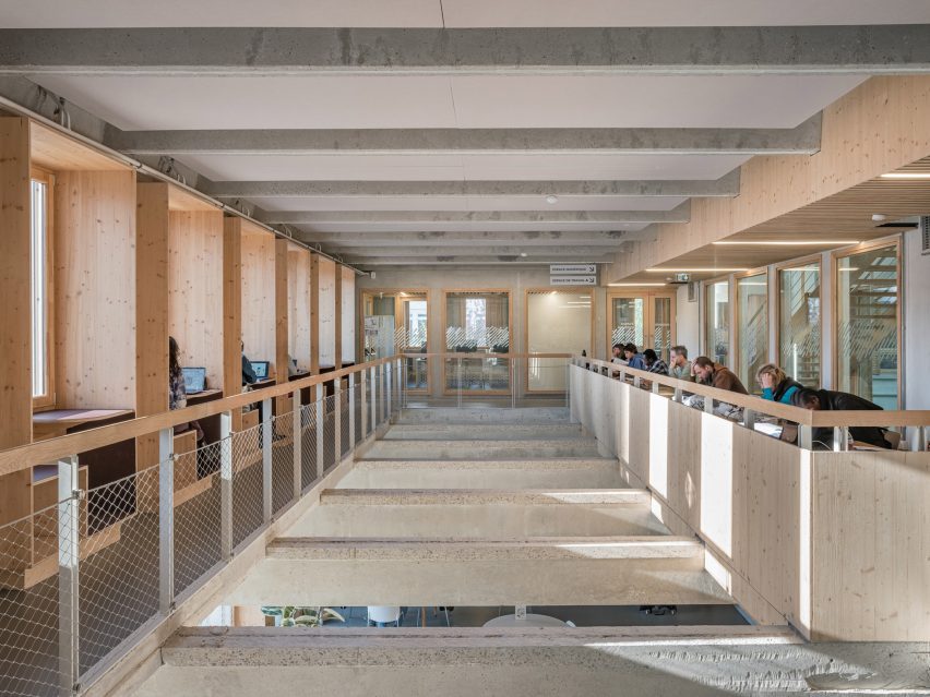 Timber and concrete media library by Associer