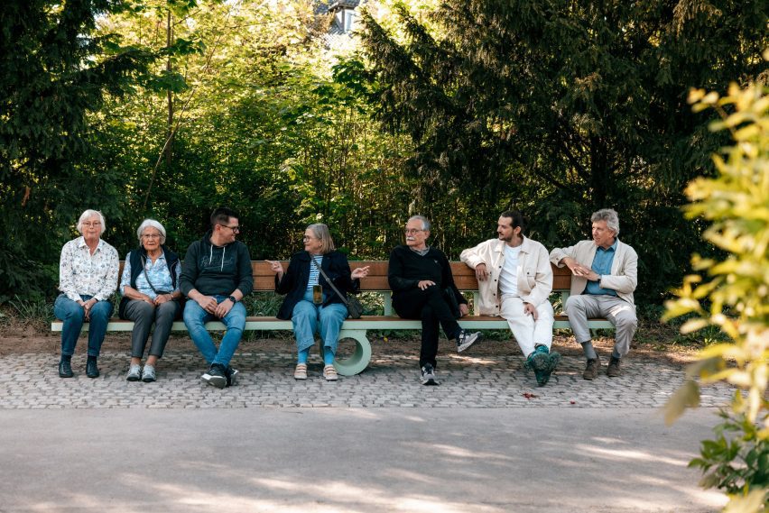 People balancing on bench