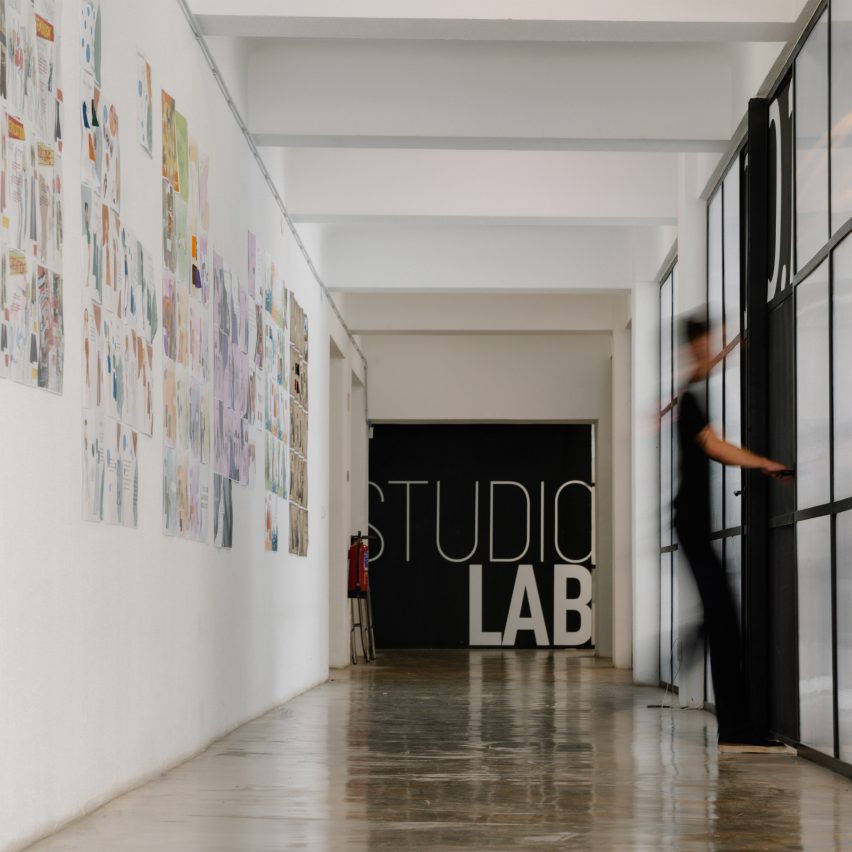 a photograph of a corridor on a university campus 