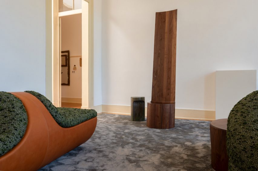 Wooden furniture with green fabric