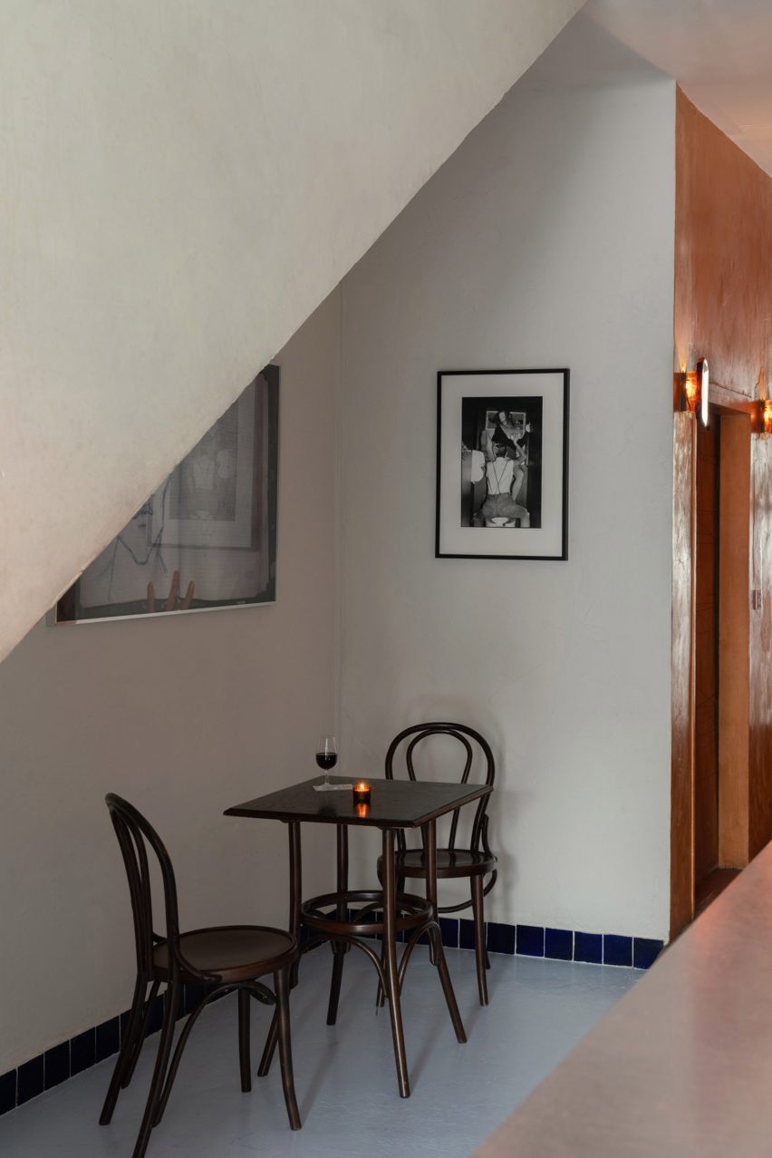 Bar interior with seats and table in nook