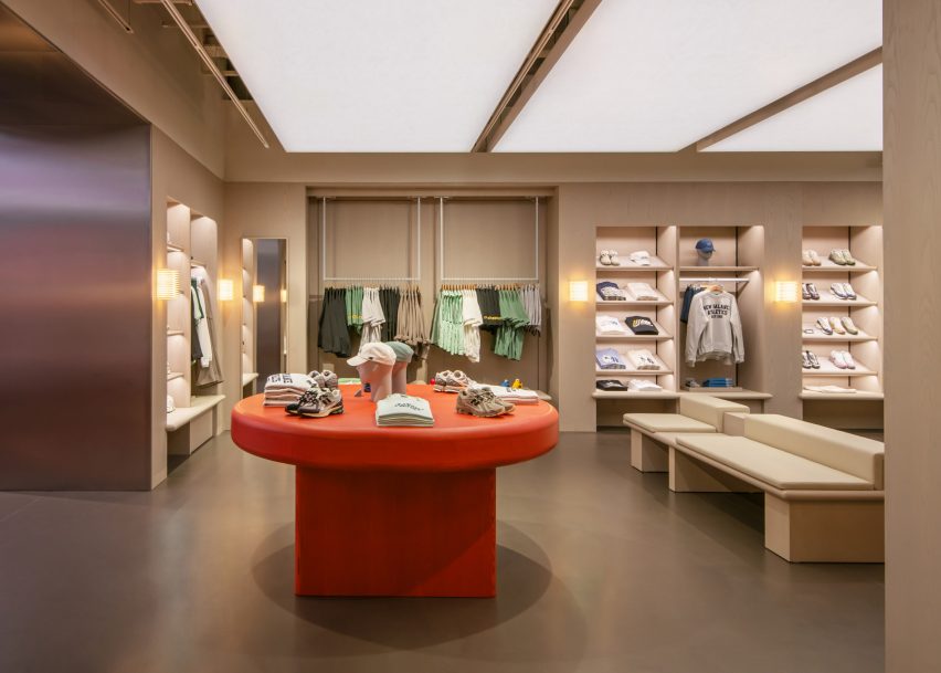 New Balance London flagship interior with big red table