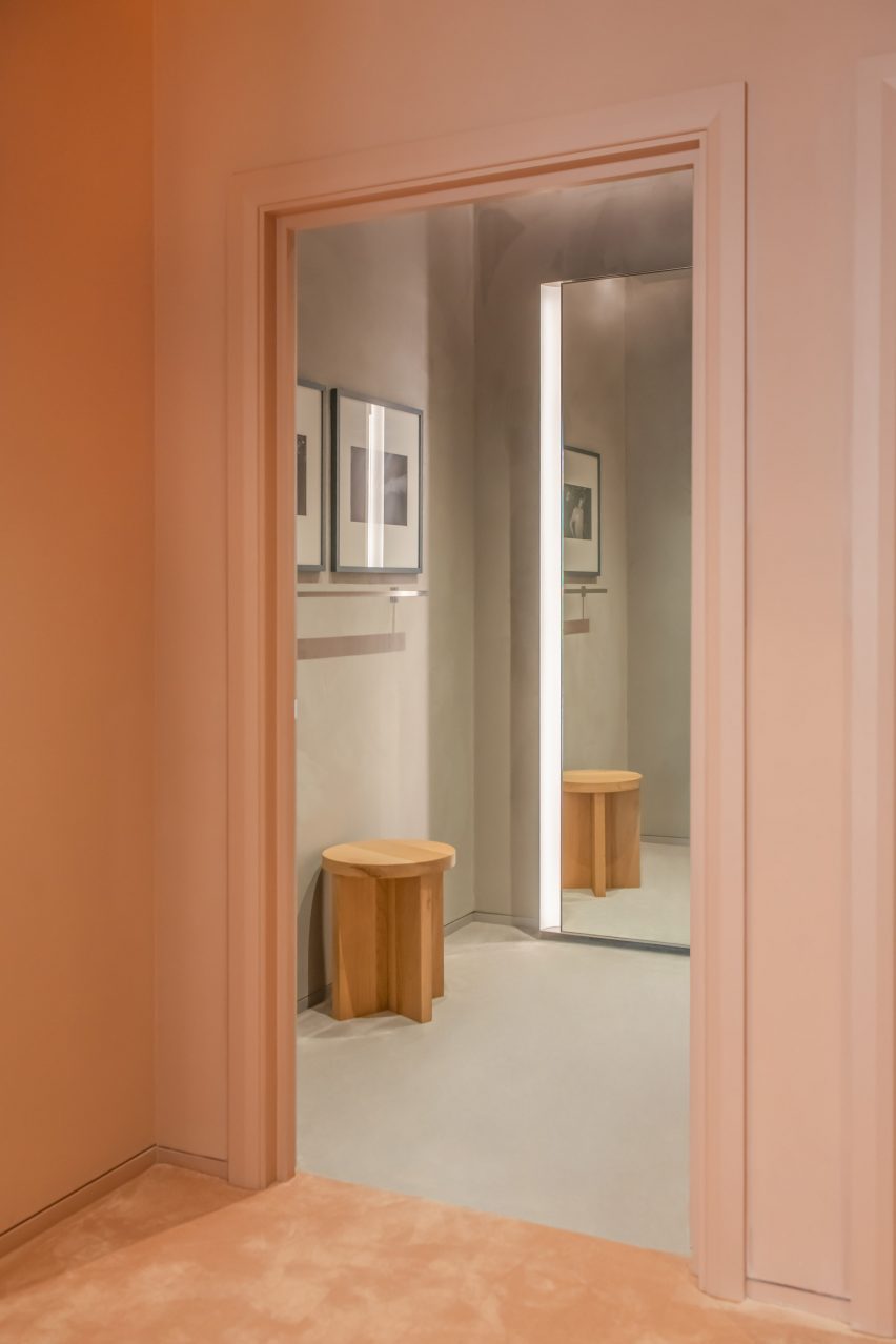 Changing rooms in sportswear store interior by MAP and Universal Design Studio