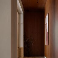 Corridor with wood-panelled walls
