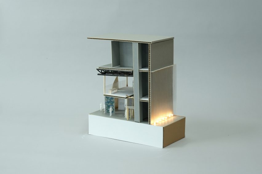 a photoraph of an architectural model in tones of grey and white