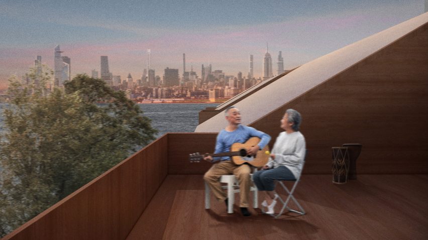 a photograph of two people sitting on a brown rooftop. one is playing a guitar