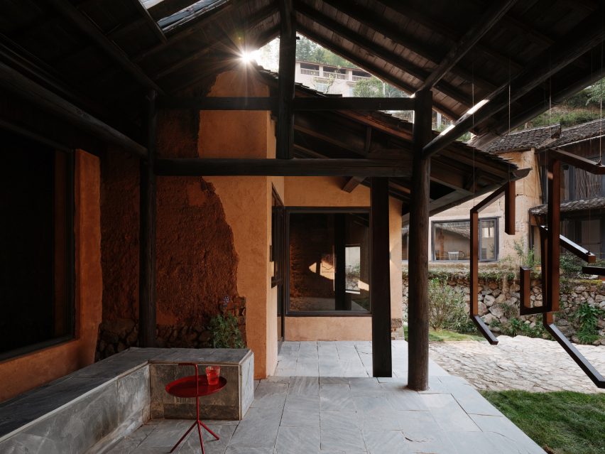 Rammed-earth house at art gallery by Team BLDG