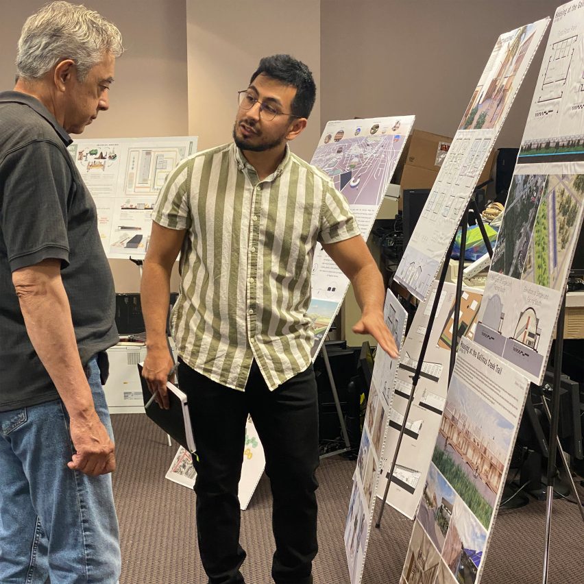 a photograph of a student presenting their work