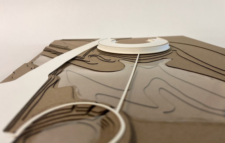 a photograph of an architectural model in tones of beige