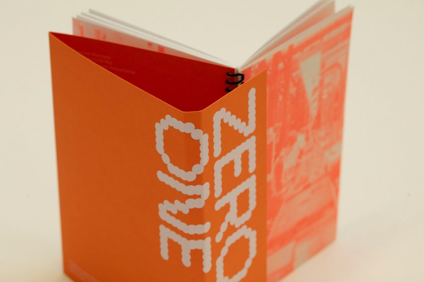 a photograph of an open book in orange and white tones