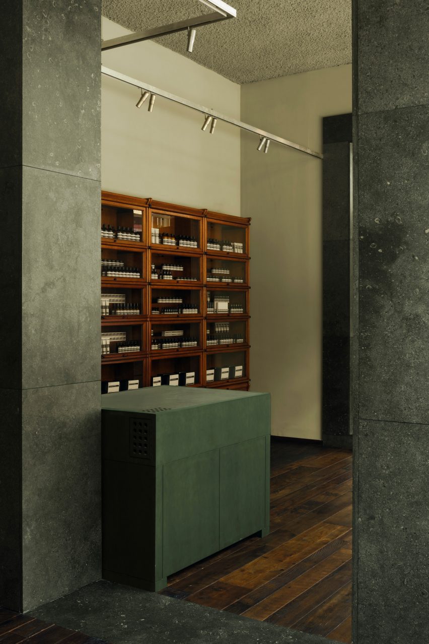 Stone details in green Aesop Leeds store