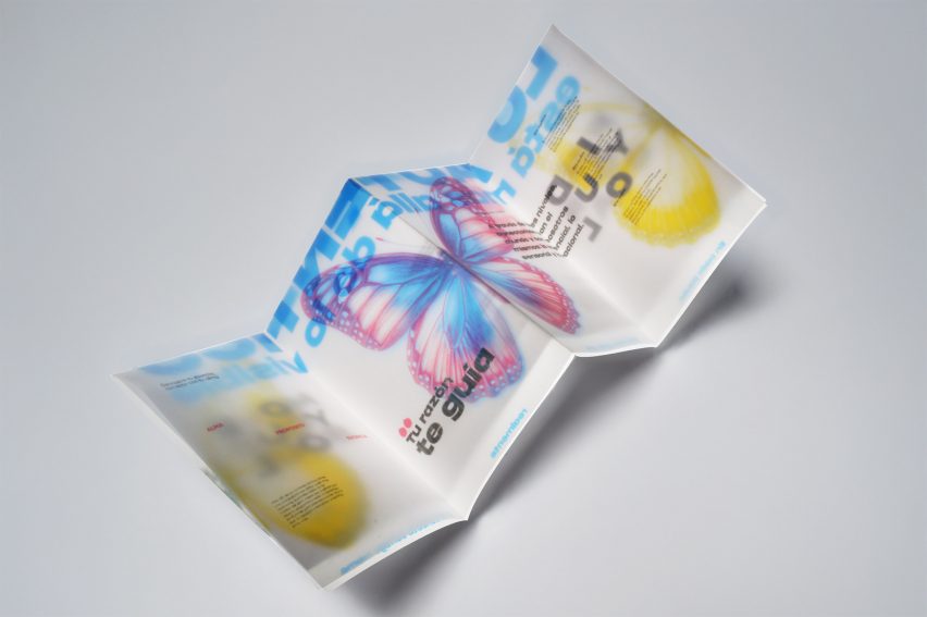 a photograph of a printed leaflet in tones of white, yellow, pink and blue