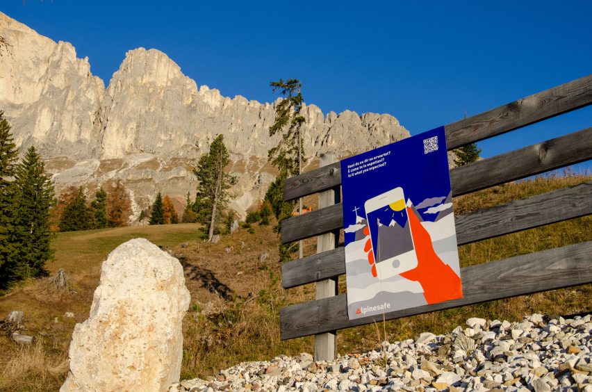 a photograph of a fence on a mountain