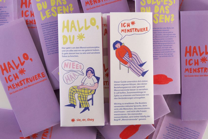 a photograph of a printed leaflet in tones of white and yellow, purple, blue and red