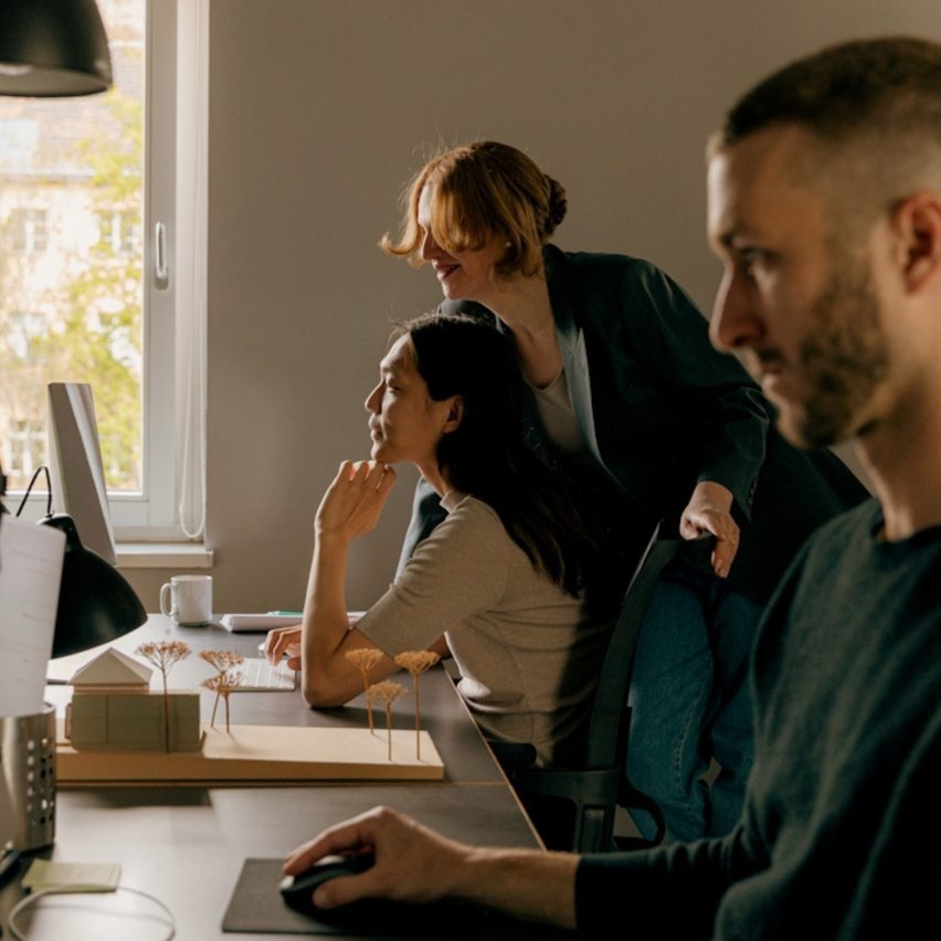a photograph of students working on computers