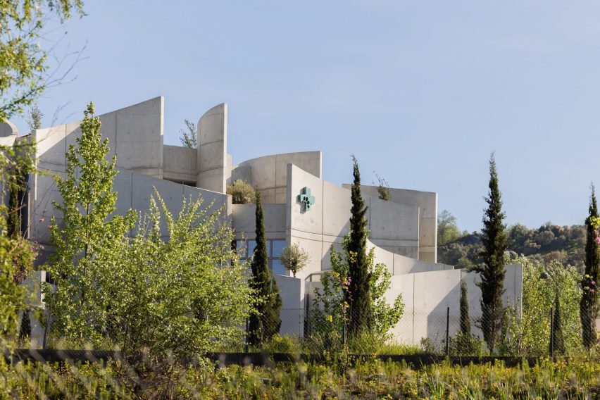 Concrete vet hospital amongst trees