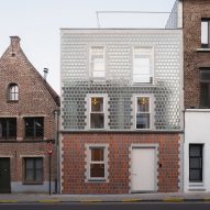 Glass-brick facade pulls light into Belgian infill home by Delmulle Delmulle Architecten