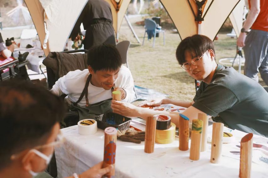 a photograph of people around a table