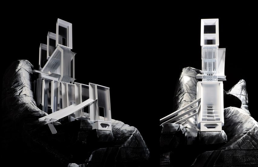 a photograph of architectural models against a black backdrop