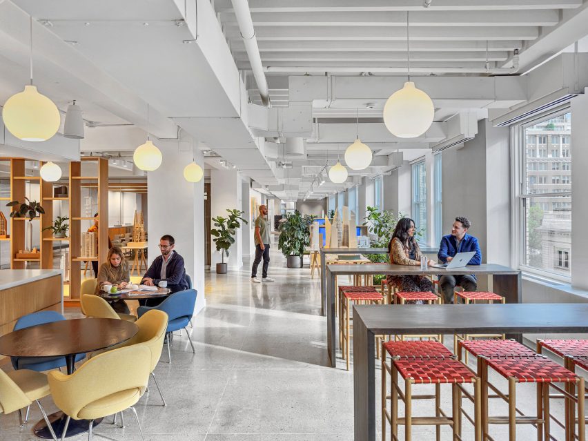 Communal area with white decor and colorful furniture