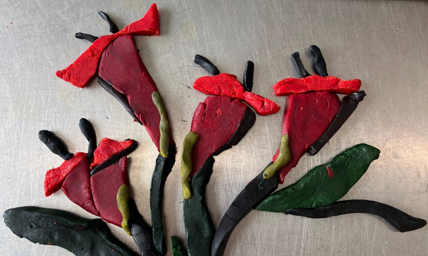a photograph of a plasticine depiction of flowers