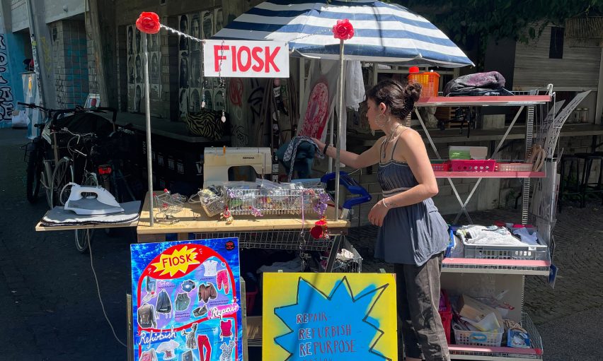 a photograph of a person tending to a stall