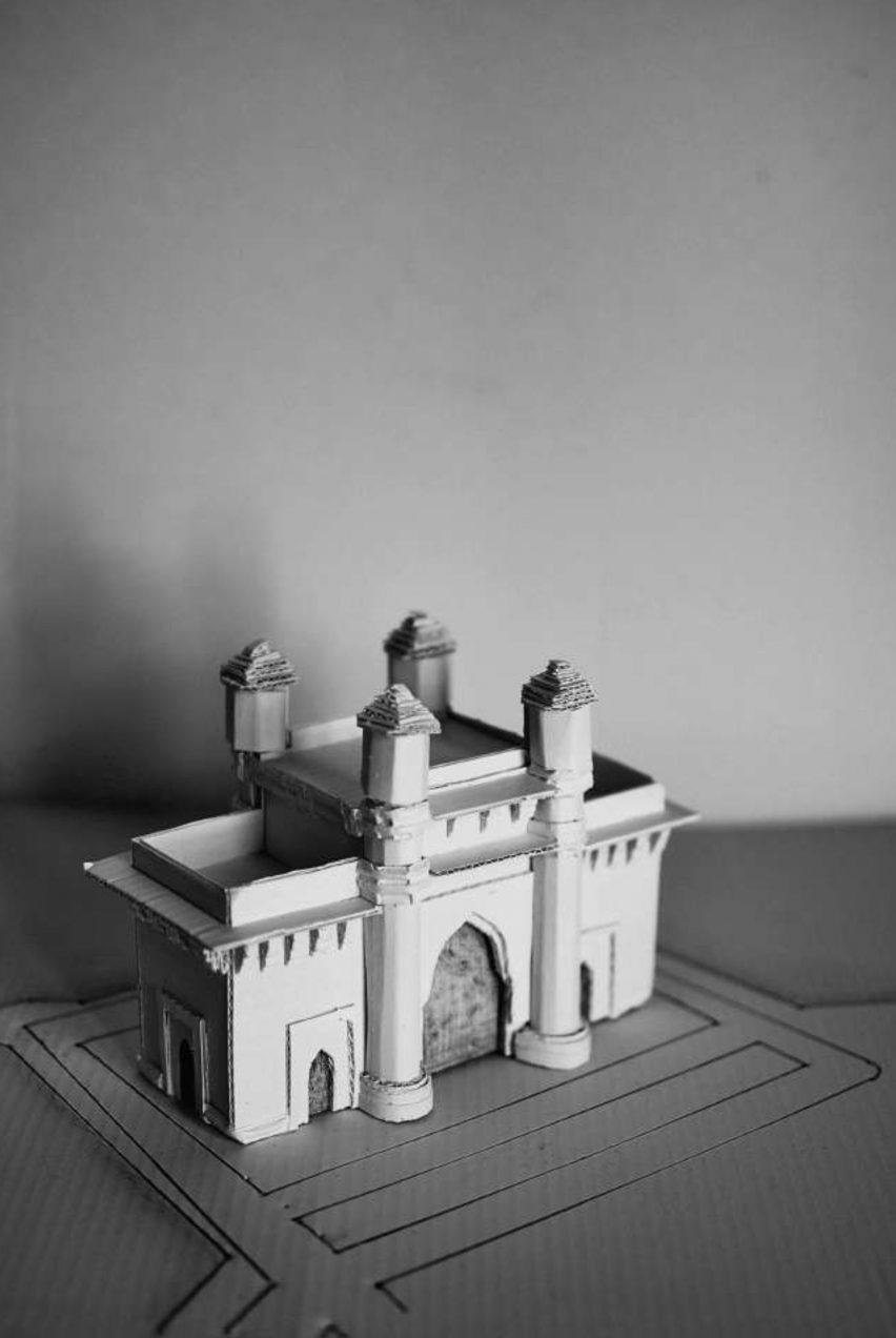 a black and white photograph of a building model