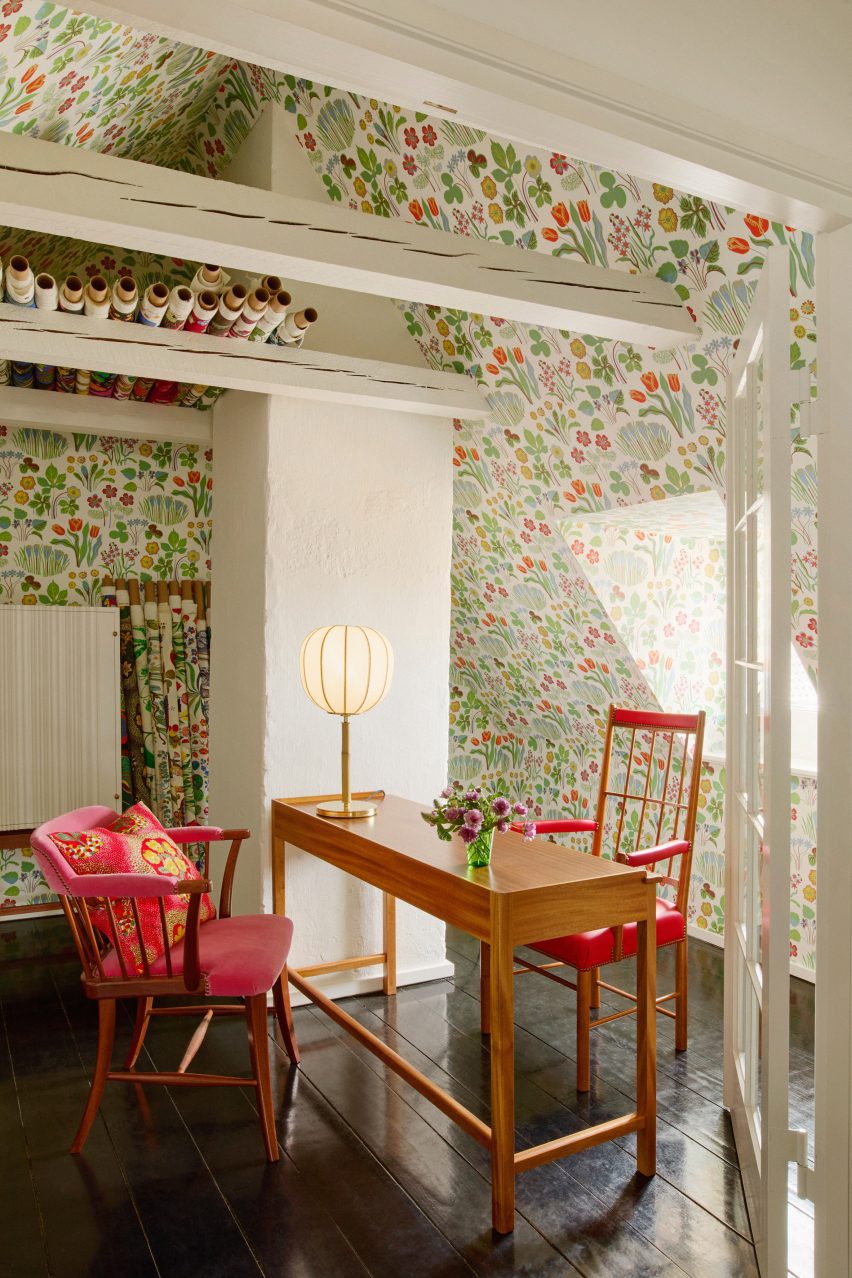 Office room with patterned wallpaper