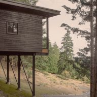 Black cabin on supports