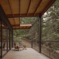 Black cabin with porch