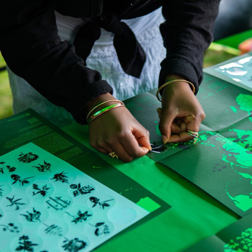a photograph of a person screenprinting