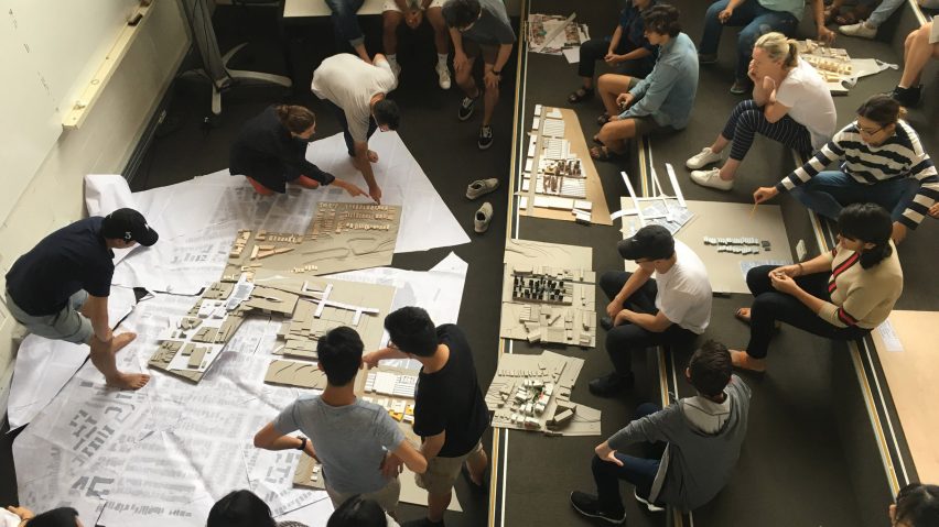 a photograph of students working in a studio